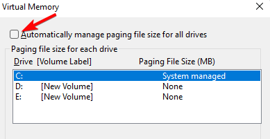 desmarque Administrar automáticamente el tamaño del archivo de paginación para todas las unidades